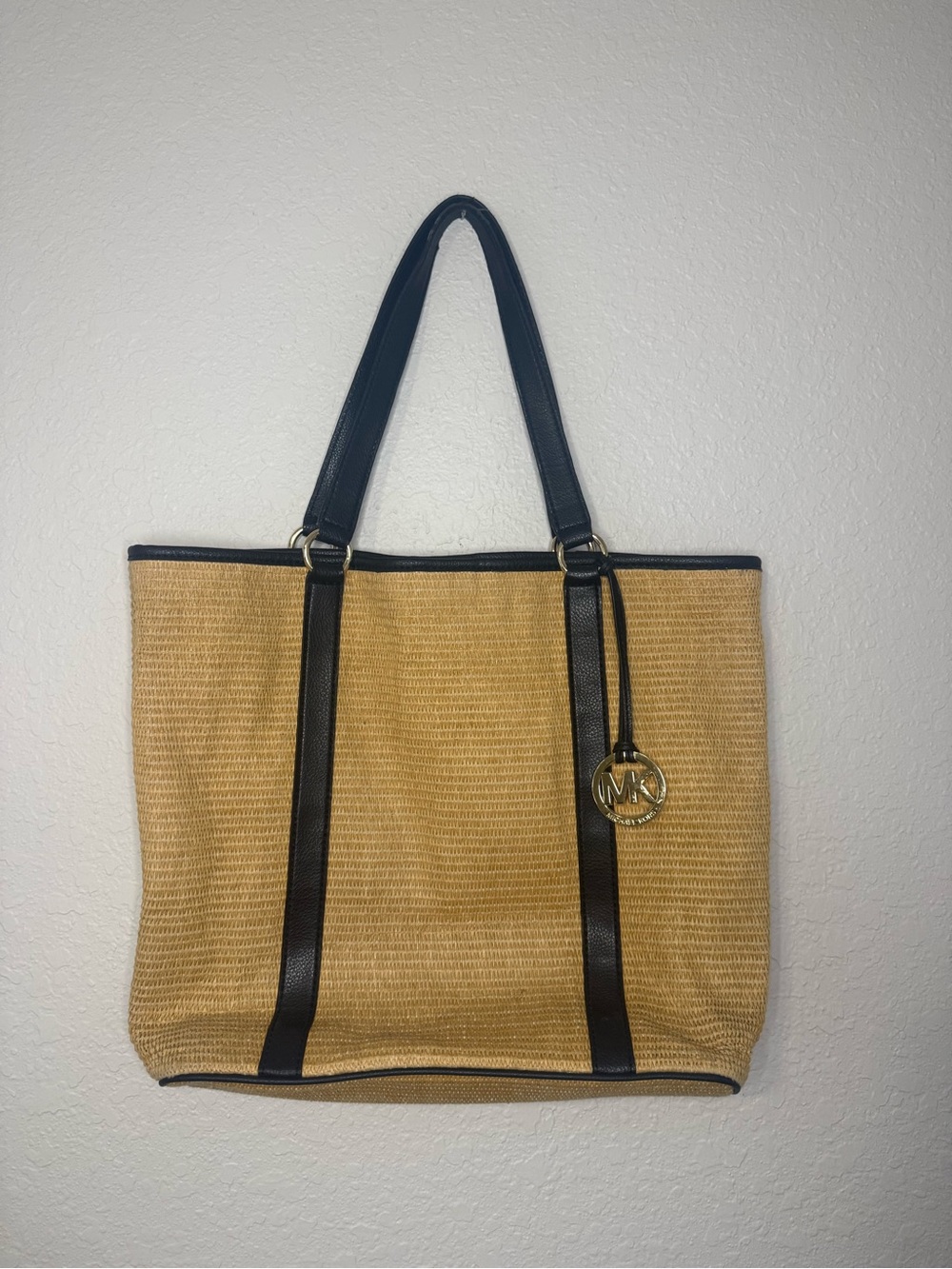 Michael Kors Natural Straw Tote with Black Trim and MK Charm